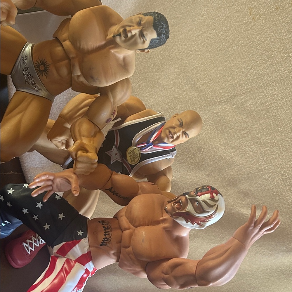 Wrestling Action Figures WWE Jakks Pacific 14 inch tall, three for one low price